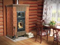 Rome brick masonry heater installed in a log cabin dining room, serving as a central heating source and pizza oven