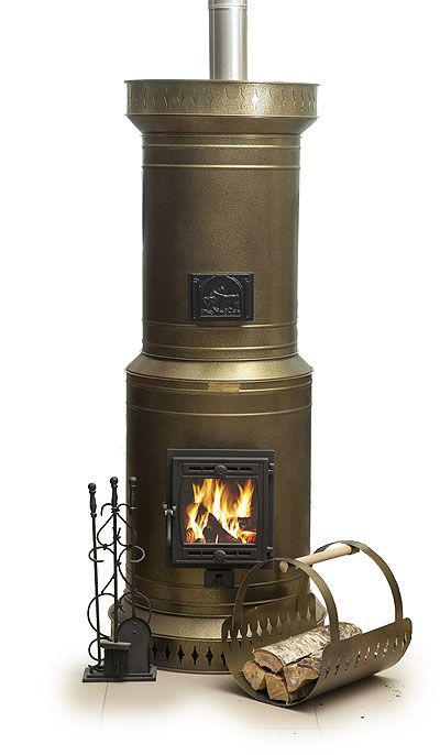 Venice 20 DIY masonry heater kit in bronze finish, showing glass firebox door with active fire, matching curved log holder, and fireplace tools